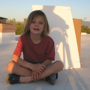 2012 partial solar eclipse on the rooftop at sundown